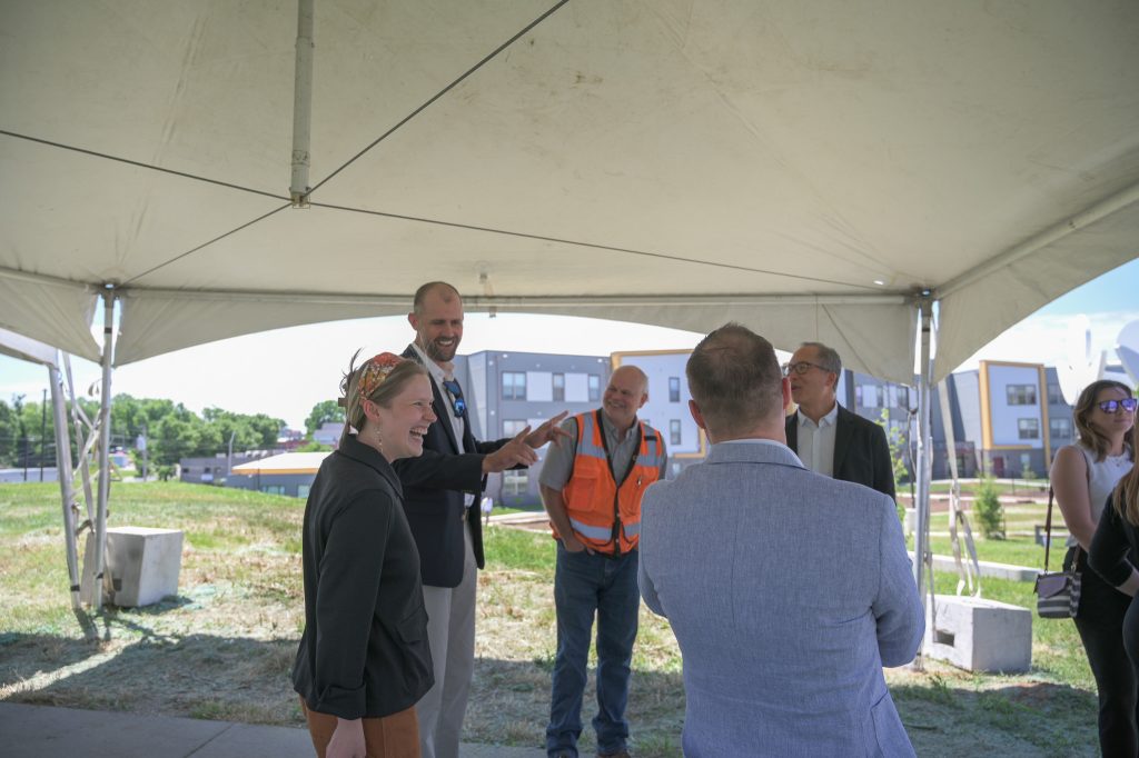 people talking at the groundbreaking event