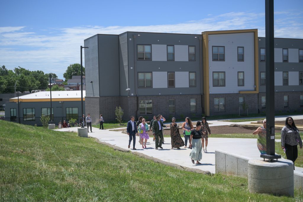 people walking to groundbreaking event