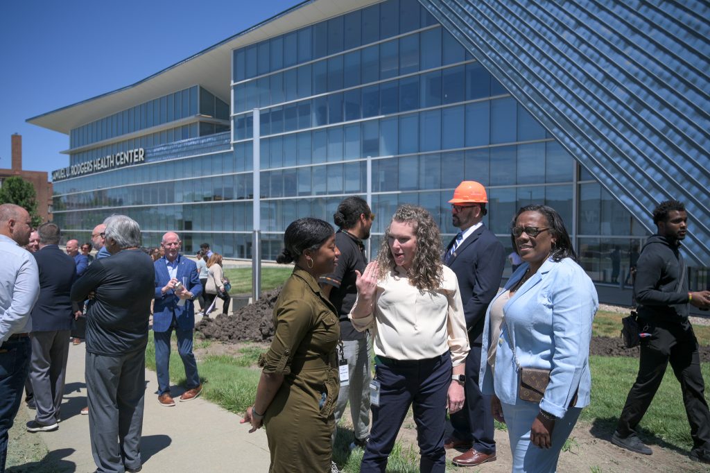 People chatting at groundbreaking event